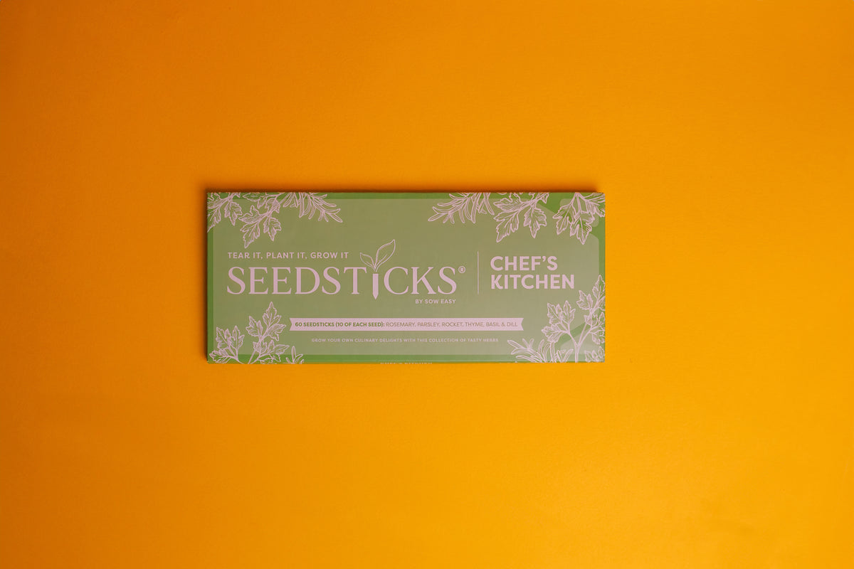 Chef’s Kitchen Seedsticks gift bar on a warm orange background