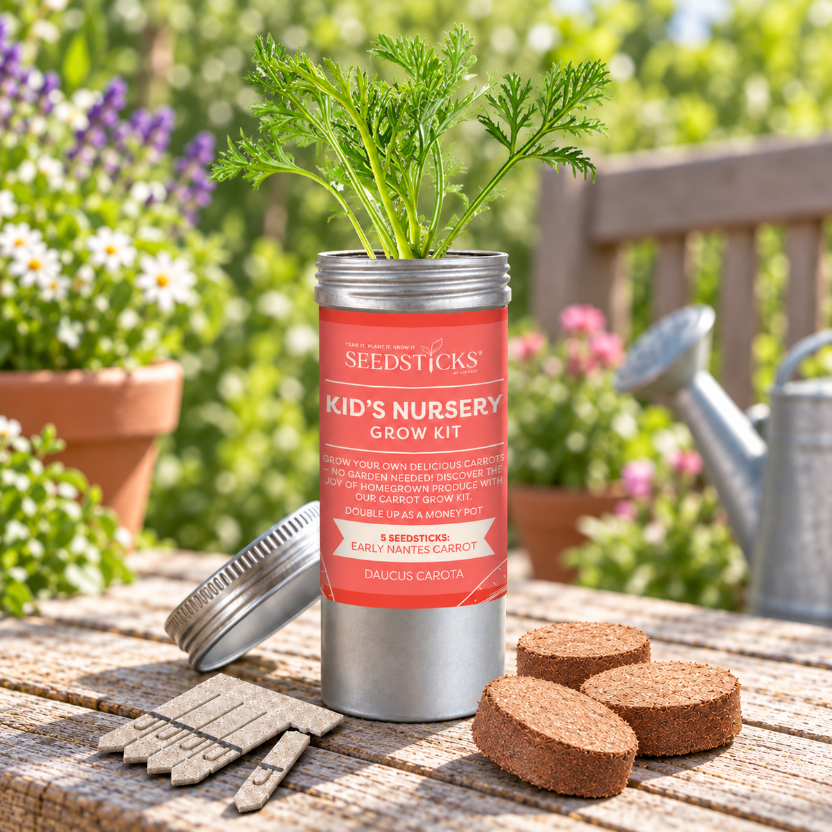 Carrot Desktop Tube Garden with soil pellets and Seedsticks in a garden setting
