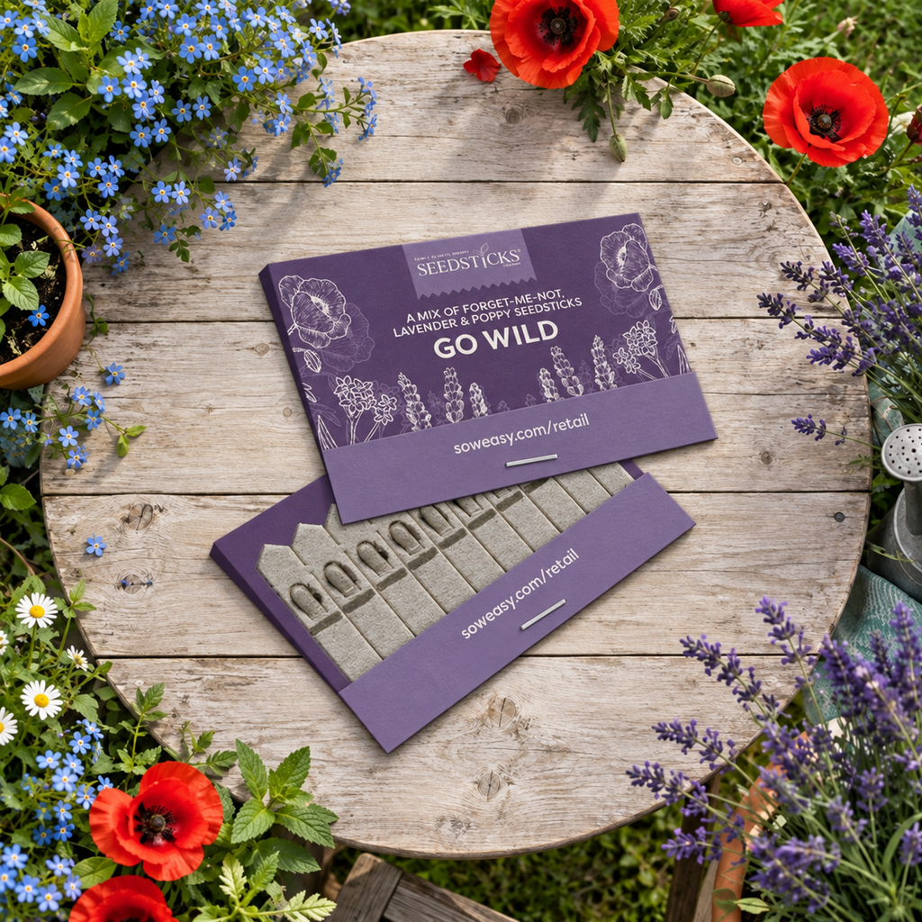 Go Wild Seedsticks packs with native wildflower planting sticks in a garden setting