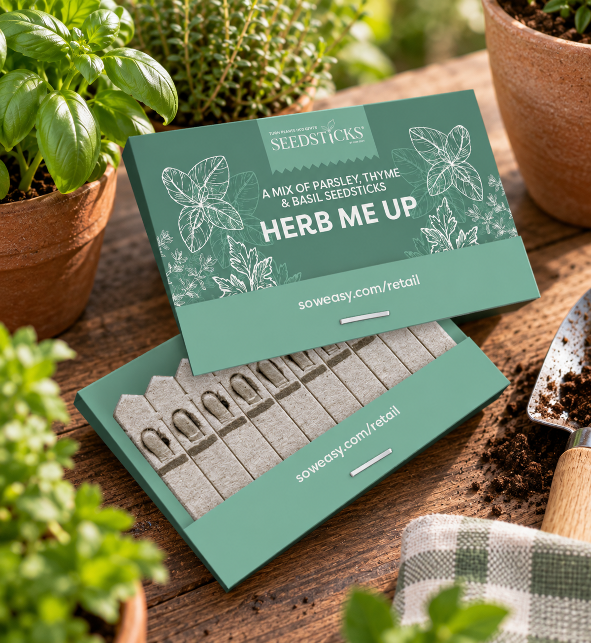 Herb Me Up Seedsticks pack opened to show the herb planting sticks in a garden setting